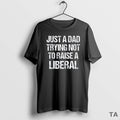 Top Just A Dad Trying Not To Raise A Liberal Vintage T Shirt Sweater