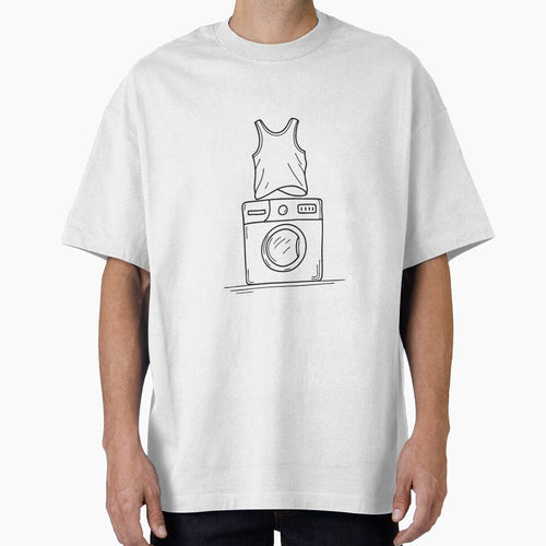 A wrinkled shirt tossed over the top of a washing machine by rasagamastore