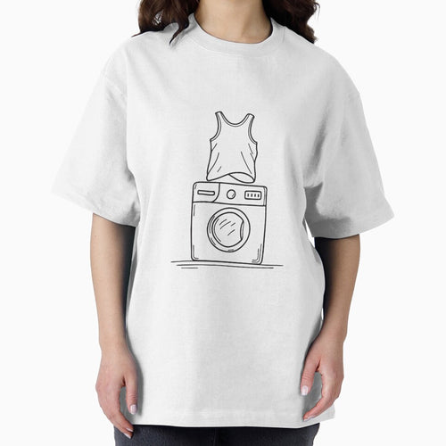 A wrinkled shirt tossed over the top of a washing machine by rasagamastore
